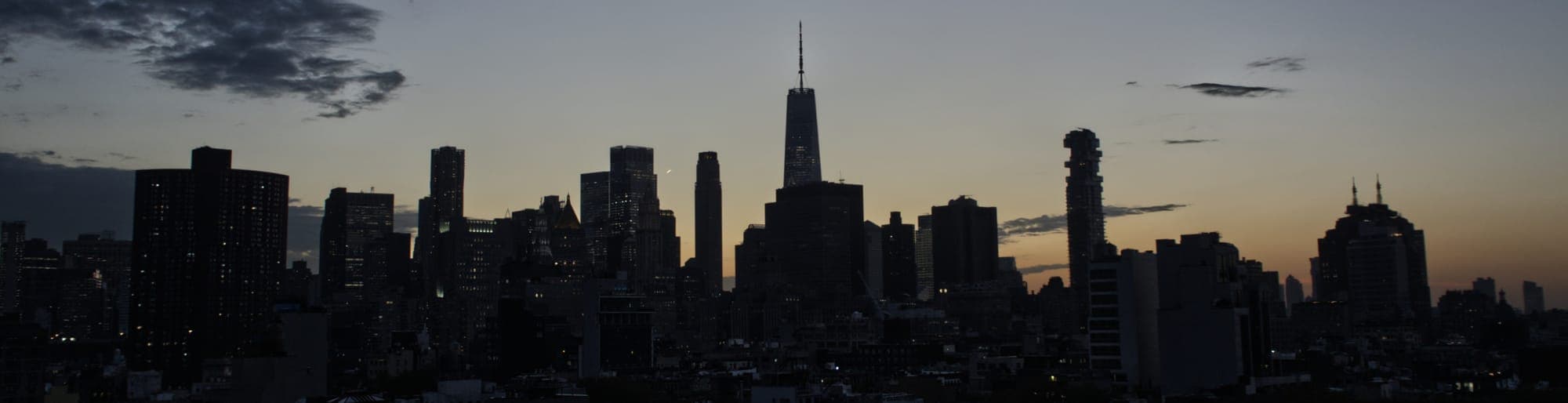 Downtown NYC skyline at sunset, as seen from Lower East Side